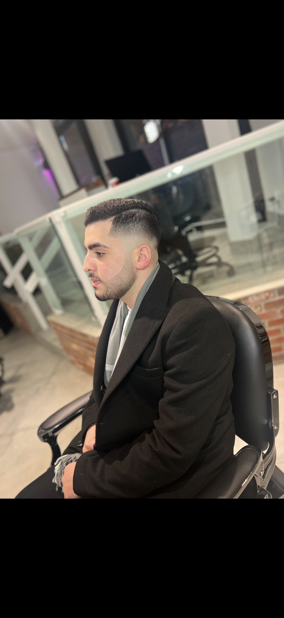Fade haircut at Kaz Barbershop